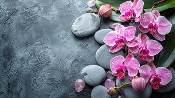 spa behandling begrepp. blommor av orkide och stenar. skön bakgrund med kopia Plats foto