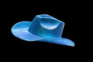 vibrerande blå cowboy hatt på svart bakgrund foto