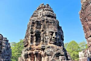 bayon tempel i kambodja, ansikten av okänd gudar foto