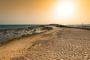 landskap av de strand av la caleta på de provins av cadiz foto