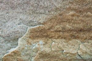 yta av naturlig sten som textur, bakgrund foto