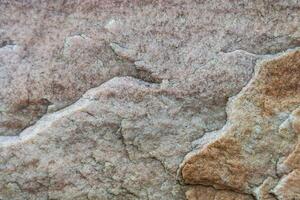 yta av naturlig sten som textur, bakgrund foto