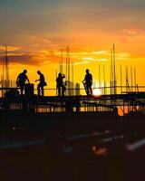 konstruktion arbetare på solnedgång foto
