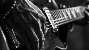 de graciös rörelser av en gitarristar fingrar är tycka om en välkoreograferad dansa varje notera försiktigt p och avsiktlig. foto