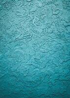 vertikal skott av de texturer och mönster av en vägg med trevlig blå måla foto