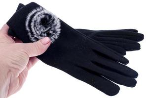 textil dam svarta handskar med pälsdekoration. foto