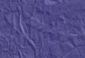 sömlös skrynkliga mörk violett hantverk papper textur. gammal klippbok papp. foto