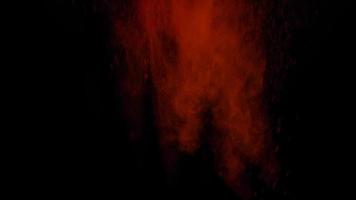 ljusröd färgglada puder explosion färgade moln damm explodera på svart foto