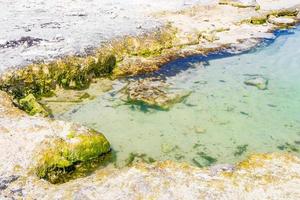 cenote vatten med sand punta esmeralda playa del carmen mexico.
