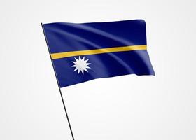 nauru flaggan vajar högt i den isolerade bakgrunden. 31 januari Naurus självständighetsdag. samling av världens nationella flagga samling av världens nationella flagga foto