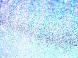 ljusblå glitter abstrakt grov cement golv textur för oskärpa bakgrund jul foto