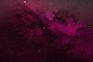 rosa utrymme färg textur abstrakt bakgrund, utrymme färg i galaxen i svart foto