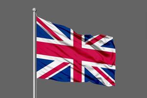 Storbritannien viftande flagga illustration på grå bakgrund foto