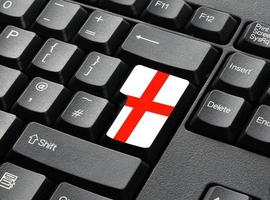 ett svart tangentbord med nyckel i flaggfärger för england foto