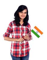 flicka med indiska flaggan eller tricolor på vit bakgrund, indiska självständighetsdagen, indiska republikens dag foto