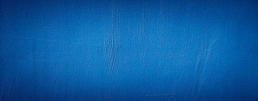 mörkblå abstrakt cement betongvägg textur bakgrund foto