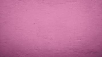 abstrakt cement betongvägg textur bakgrund med rosa färg foto