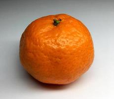 bilden visar hel mogen citrusfruktmandarin foto