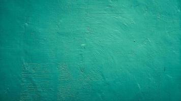 reen blå kricka abstrakt textur cement betongvägg bakgrund foto