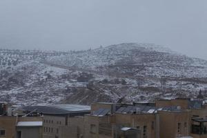 snö i Jerusalem och de omgivande bergen foto