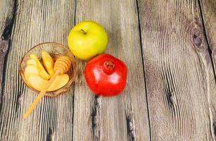 judiskt nyår - rosh hashanah - äpple och honung. foto