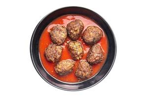 köttbullar tomatsås kött nötkött kalvkött fläsk lamm färsk måltid mat diet mellanmål foto