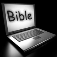 bibelord på bärbar dator foto