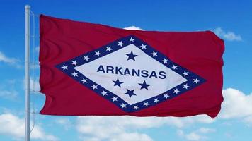 Arkansas flagga vajar i vinden, blå himmel bakgrund. 3d-rendering foto