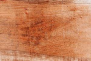 trä textur bakgrund, vittrad brun planka från lada foto