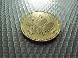 japanska pengar, silvermynt, yen foto
