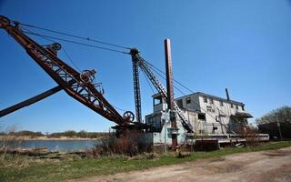 muddringsmaskin vid riverton i Manitoba foto