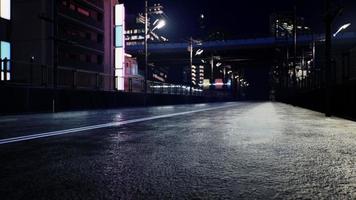 nattscen i japan city med neonljus foto