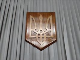 emblem av Ukraina symbol treudd tecken grå våg bakgrund foto