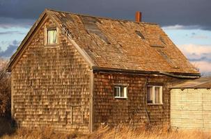 gammal övergiven saskatchewan bondgård foto