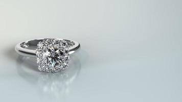 förlovningsring i vitguld med stor diamantsten foto