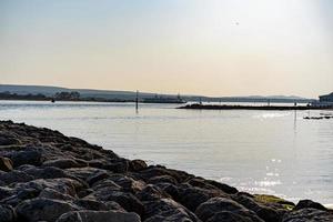 sandbanks hamn vid solnedgången foto