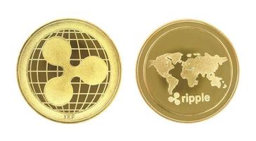 gyllene krusning xrpcoin isolerad på vit bakgrund. foto