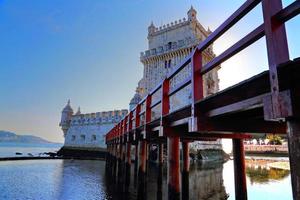 Lissabon, belem tornet vid solnedgången foto