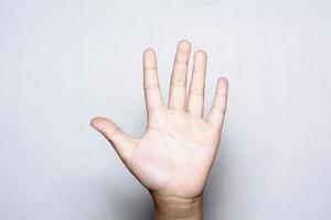 flicka fem fingrar upp till hands foto