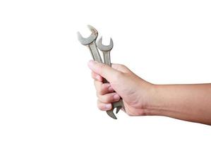 mekaniker handhåll nyckelverktyg i handen foto