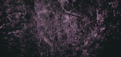 vägg full av repor, skrämmande mörk vägg, grungy cement textur för bakgrund foto