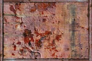 abstrakt konsistens av rostig metall. en sprucken rostmetallvägg. bakgrund för design foto