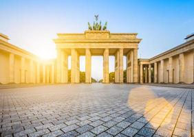 Brandenburg gate vid soluppgången, Berlin, Tyskland