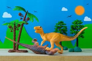 dinosaurie kamp scen på vilda modeller bakgrund foto