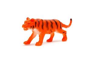 tiger modell isolerad på vit bakgrund, djur leksaker plast foto