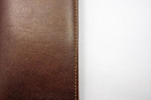 brun läderplånbok foto