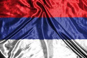 serbien tyg flagga satin flagga viftande tyg textur av flaggan foto