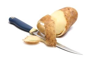 potatis och kniv foto