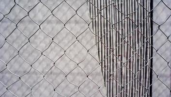 betongvägg textur med mesh bakgrunder foto