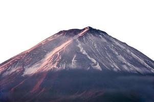 berget fuji med snötäckt och solljus foto